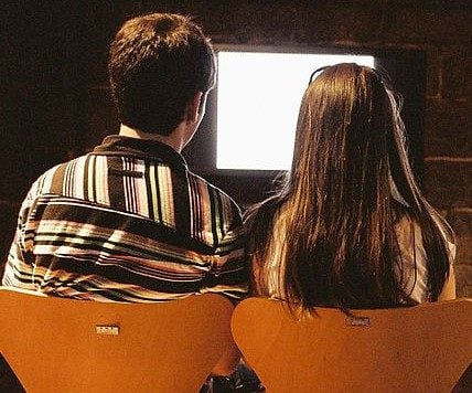 couple looking tv